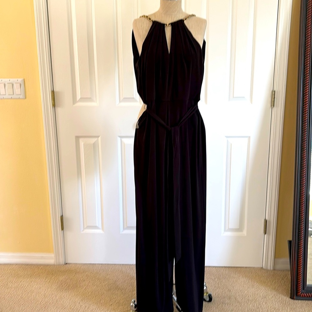 White House black market black sleeveless beautifully, detailed jumpsuit.